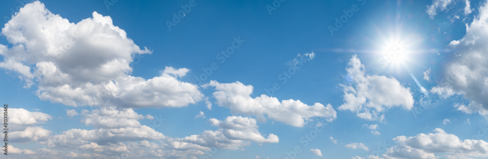 Beautiful blue sky with white clouds and sun Beautiful blue sky with white clouds and sun