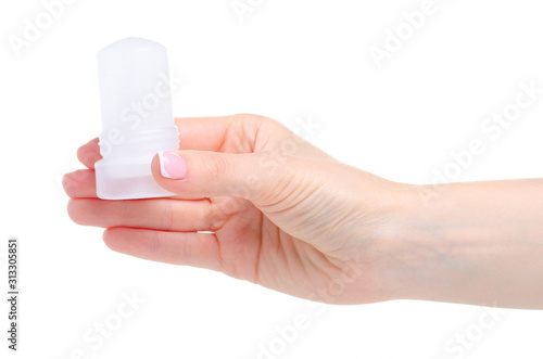 natural organic deodorant, mineral alum crystal stick in hand on white background isolation