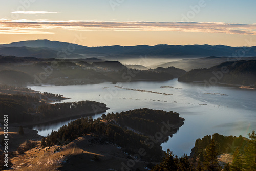 Aerial view of Dospat dam in Rhodope Mountains,.Bulgaria during sunrise 
