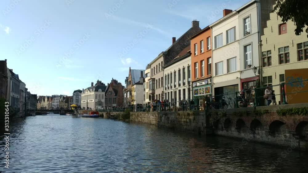 Ghent, Belgium casual view on the buildings streets and roads with tourists walking around Ghent, Belgium casual view on the buildings streets and roads with tourists walking around