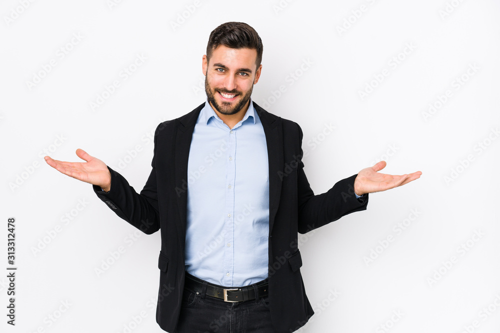 Young caucasian business man against a white background isolated showing a welcome expression. Young caucasian business man against a white background isolated showing a welcome expression.