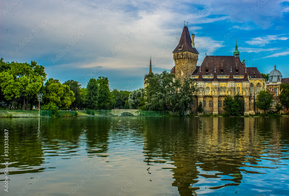 old European castle palace medieval times architecture building in Budapest capital of Hungary in summer time near lake waters environment old European castle palace medieval times architecture building in Budapest capital of Hungary in summer time near lake waters environment