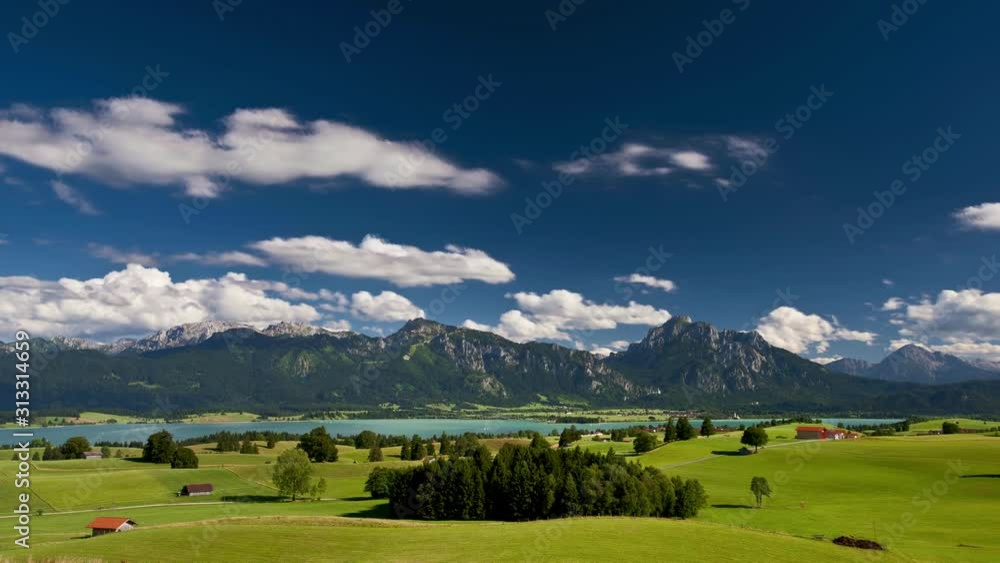 moving clouds on sky over alps mountain range in Bavaria moving clouds on sky over alps mountain range in Bavaria