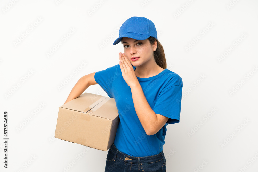Young delivery girl over isolated white background whispering something Young delivery girl over isolated white background whispering something