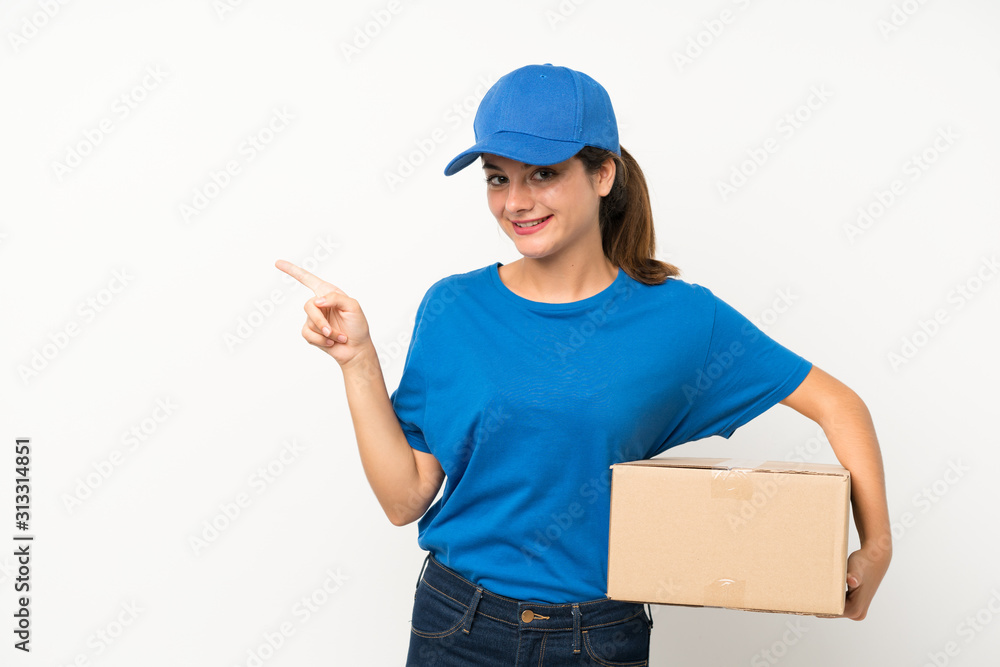 Young delivery girl over isolated white background pointing finger to the side Young delivery girl over isolated white background pointing finger to the side