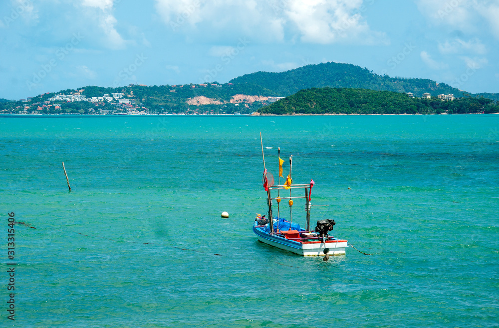Fototapeta premium Floating boat in the sea