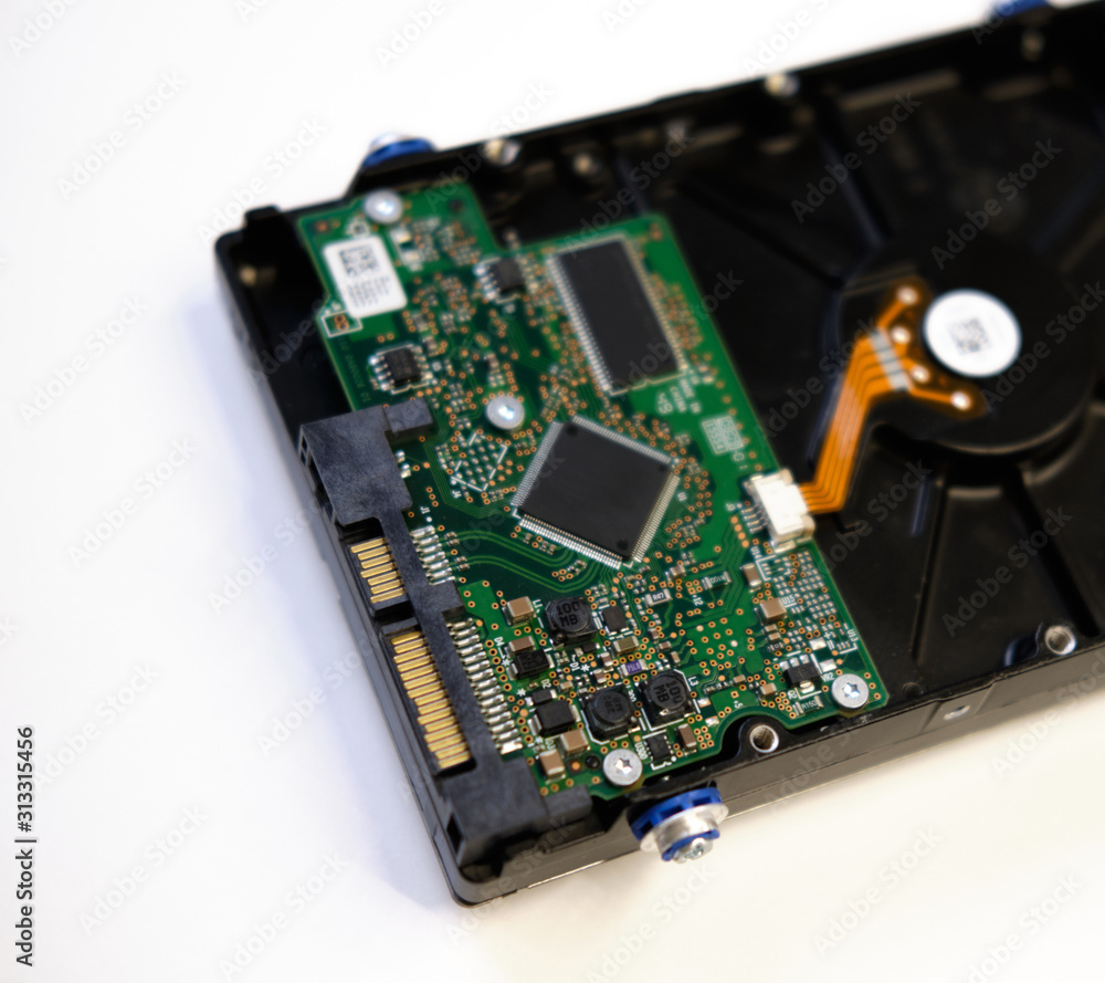 Computer hard drive on a wight background. Computer data storage Computer hard drive on a wight background. Computer data storage