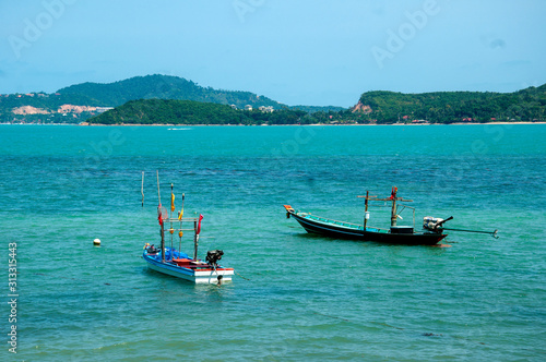 Floating boat in the sea © redbeach