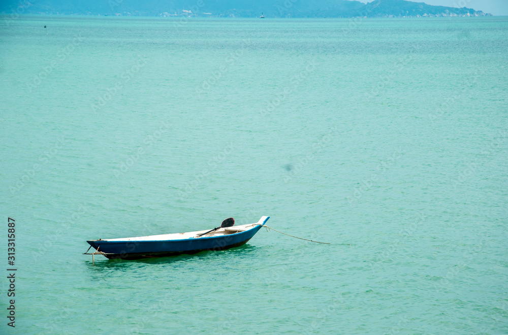 Floating boat in the sea