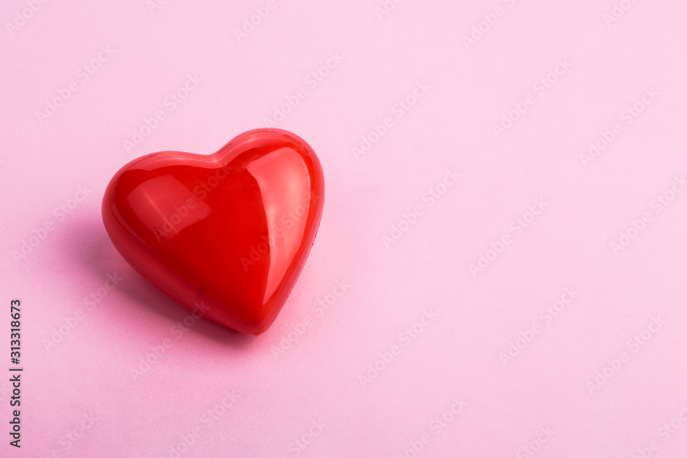 Fototapeta premium red heart on a pink background