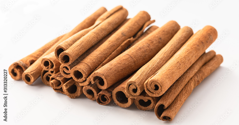 Cinnamon sticks isolated on white background. Cinnamon sticks isolated on white background.