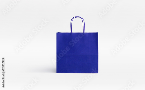 simple blue paper bag with twisted handles