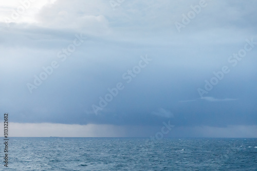 Dark storm clouds over the sea