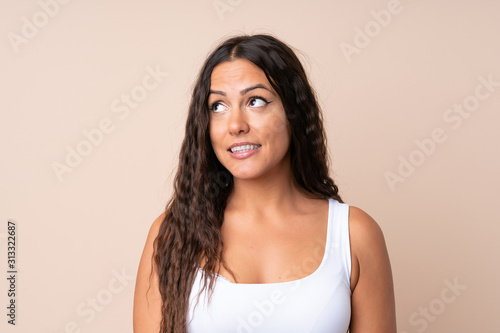 Portrait of young woman over isolated background