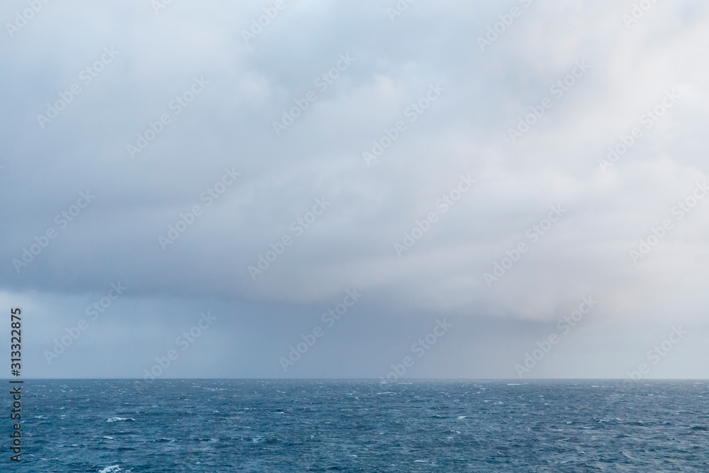 Dark storm clouds over the sea