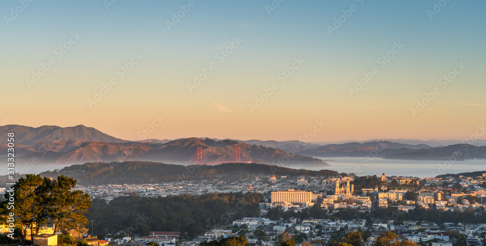 Sunrise Time Over the Golden Gate Bridge and Part of Downtown San Francisco