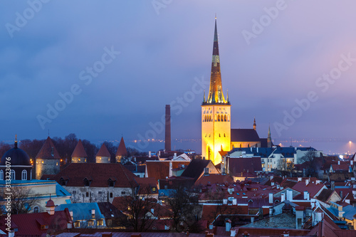Illuminated church St. Olaf in Tallinn at night