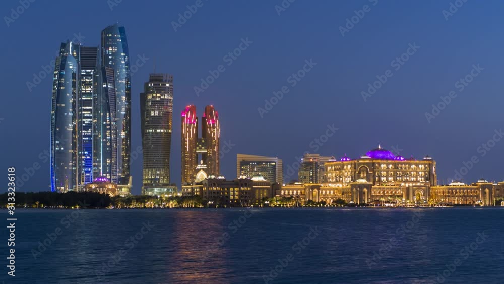 Etihad Towers and Emirates Palace hotel time lapse viewed from the Breakwater, Abu Dhabi, United Arab Emirates, Middle East Etihad Towers and Emirates Palace hotel time lapse viewed from the Breakwater, Abu Dhabi, United Arab Emirates, Middle East