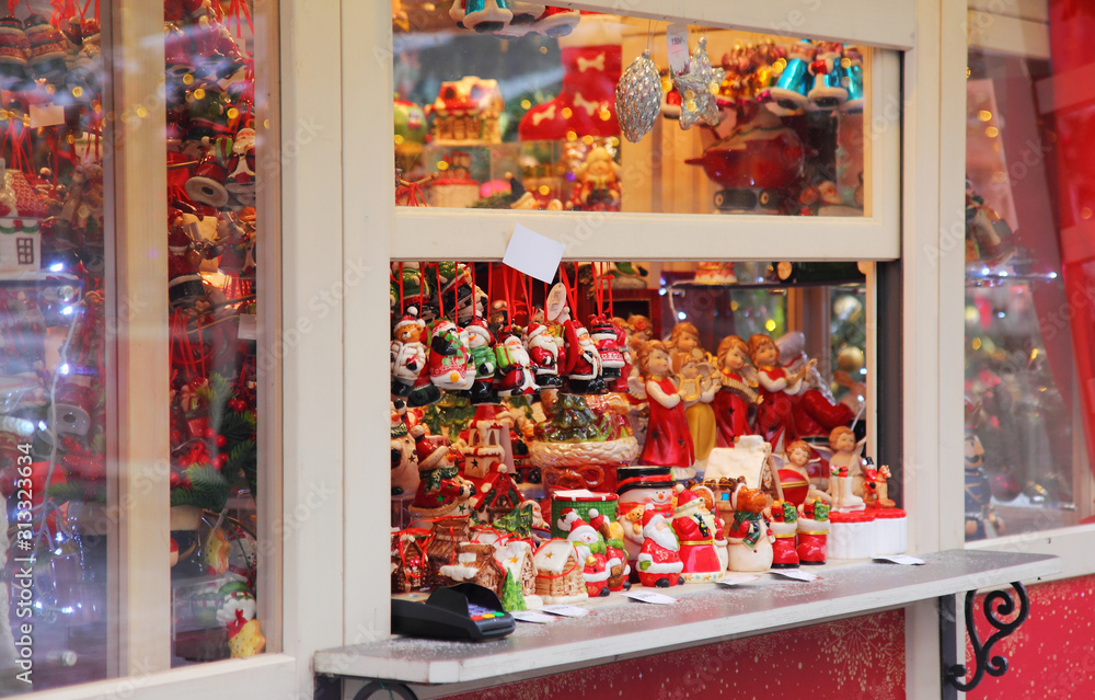 Christmas street fair-shop of handmade Christmas toys and souvenirs. View of the showcase outside.