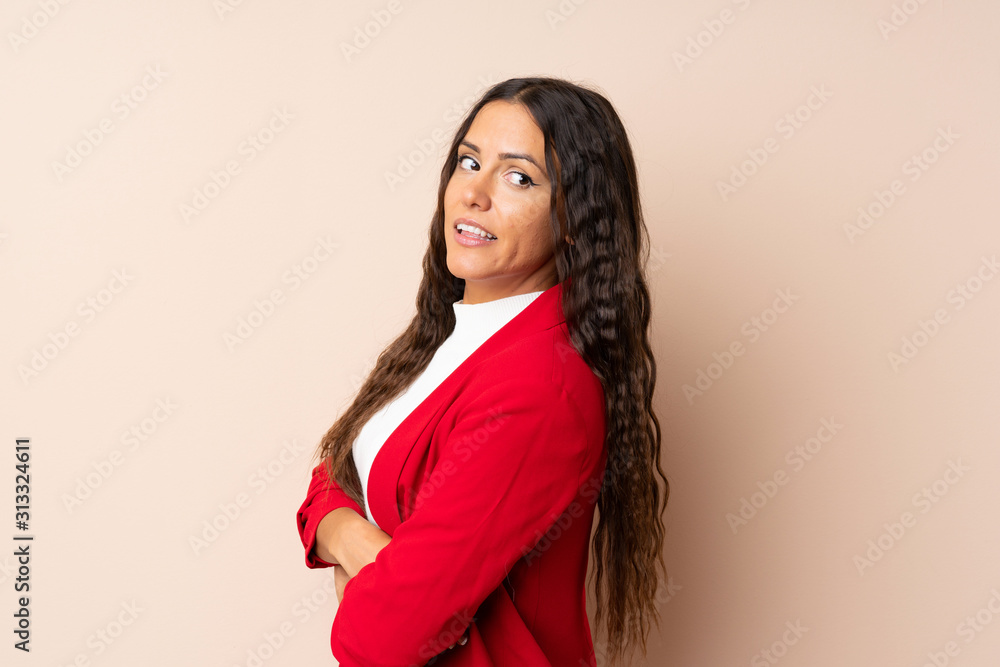 Young woman over isolated background laughing Young woman over isolated background laughing