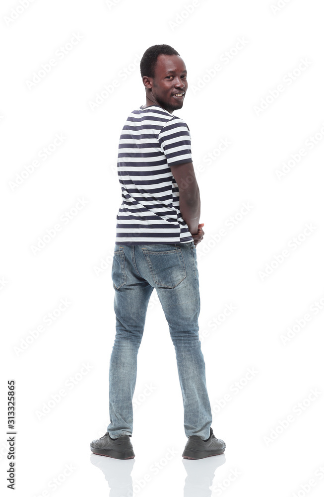 stylish young man looking back. isolated on white stylish young man looking back. isolated on white