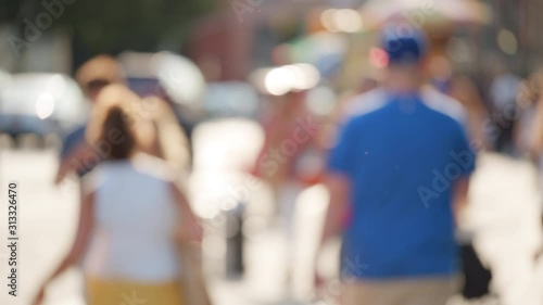 Wallpaper Mural Abstract blurry pedestrians, everyday urban NYC image with diverse unfocused people walking, sunny bright summer day Torontodigital.ca