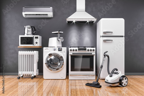 Set of home kitchen appliances in the room on the wall background