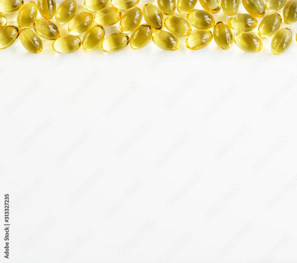 Omega-3 fish oil capsules are located on the top line for the cardiovascular system of the body with an empty place for text. View from above Omega-3 fish oil capsules are located on the top line for the cardiovascular system of the body with an empty place for text. View from above