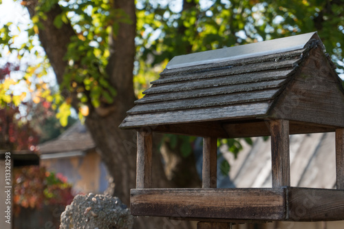 Wooden birdhouse in the garden