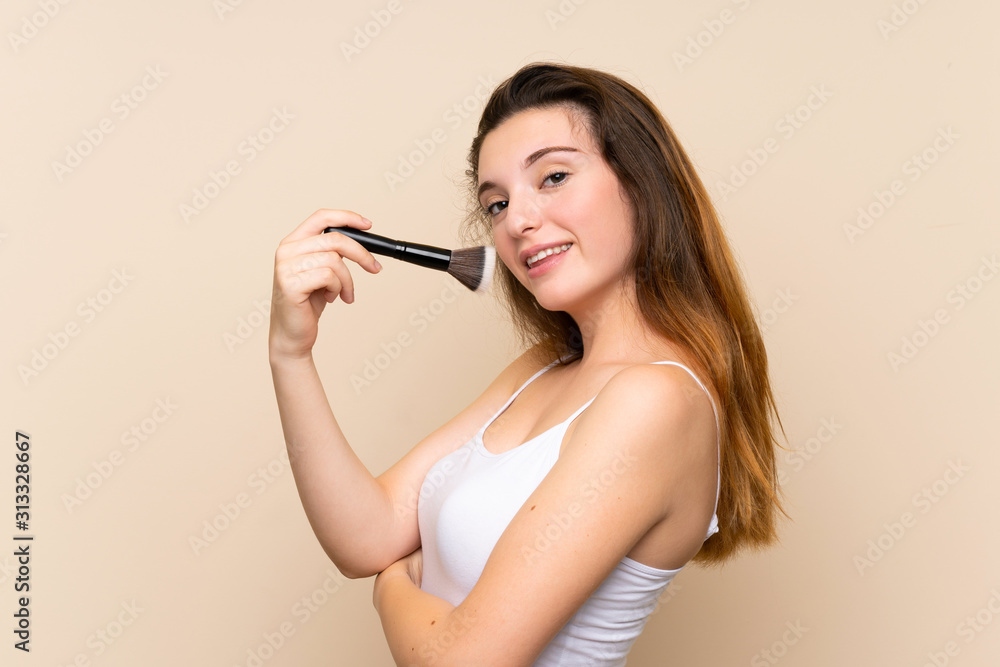 Young brunette girl over isolated background Young brunette girl over isolated background