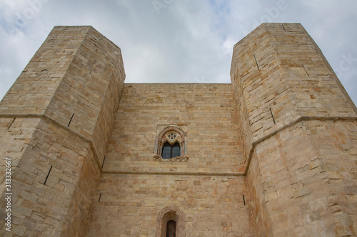 Close up on fortification detail of castle. Low angle view on walls and towers