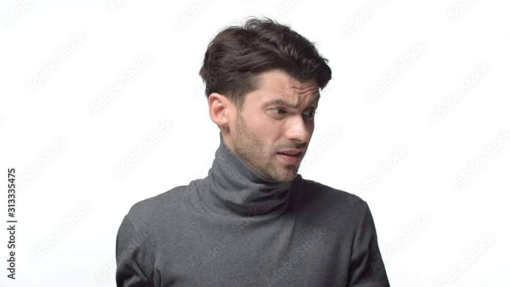 Problematic situation. Slow-motion indecisive puzzled and confused handsome bearded male in turtleneck, shaking hands dismay, frustrated, cant undertstand, standing clueless white background Problematic situation. Slow-motion indecisive puzzled and confused handsome bearded male in turtleneck, shaking hands dismay, frustrated, cant undertstand, standing clueless white background