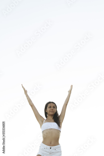 Young athlete girl doing yoga asanas