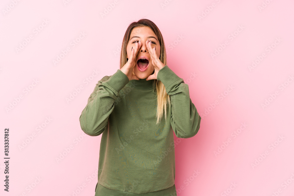 Young caucasian woman posing isolated shouting excited to front. Young caucasian woman posing isolated shouting excited to front.