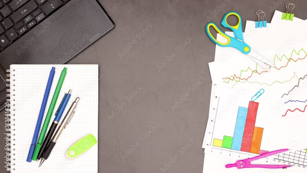 Business supplies and statistics plans appear on left and right side of table - Stop motion Business supplies and statistics plans appear on left and right side of table - Stop motion