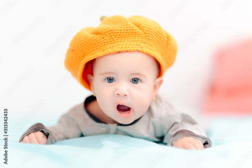 Funny Baby Girl Wearing Knitted Pumpkin Hat Funny Baby Girl Wearing Knitted Pumpkin Hat