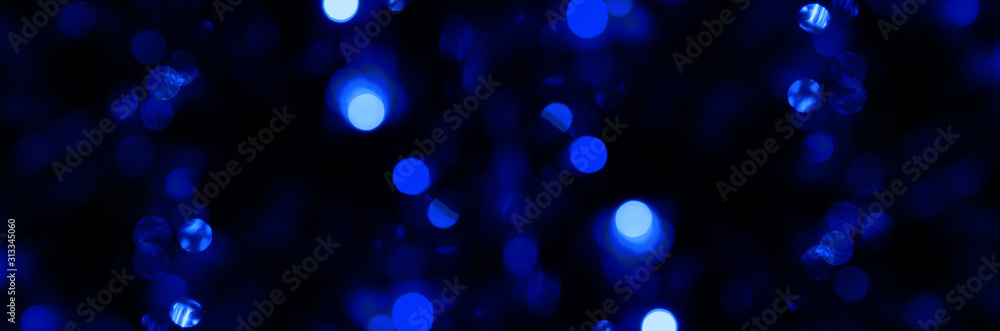 Bokeh or blur lighting abstract Background. Sparkling circular stars motion 3D animation. Holiday concept background with shimmering vibrant shapes. Flashing christmas tree lights. Trendy of the 2020