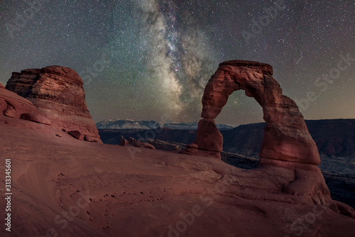 Long exposure milky way and light painting on Delicate Arch