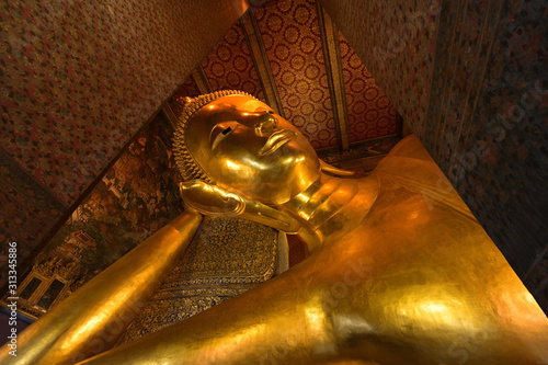 Reclining Buddha gold statue. Wat Pho, Bangkok, Thailand