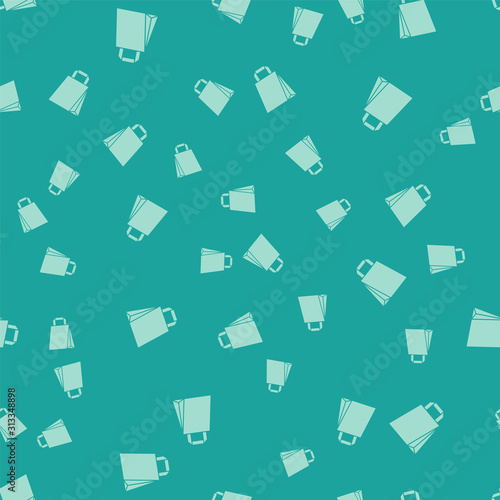 Green Paper shopping bag icon isolated seamless pattern on green background. Package sign. Vector Illustration