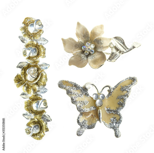 flower brooches on white background © xiaoliangge