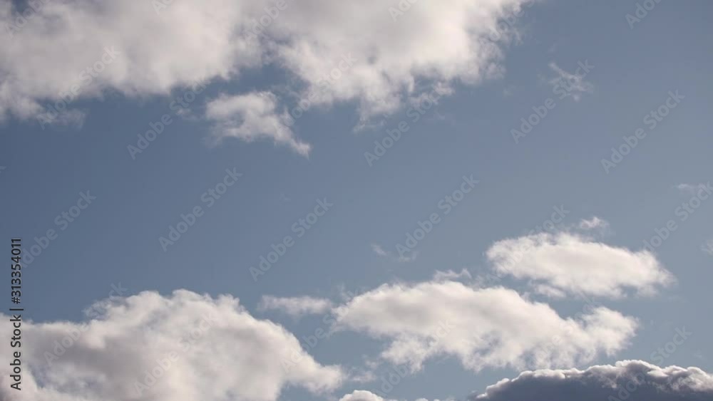 Thickening of pre-storm white clouds in the blue sky. fluffy, puffy clouds landscape. High solar Cumulus clouds.Cloudless sky before the storm Thickening of pre-storm white clouds in the blue sky. fluffy, puffy clouds landscape. High solar Cumulus clouds.Cloudless sky before the storm