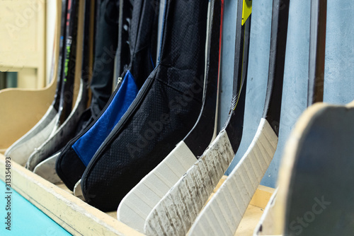Hockey sticks near the locker room before the game