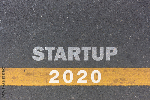 2020 year and business concept. startup message or words print on the road background
