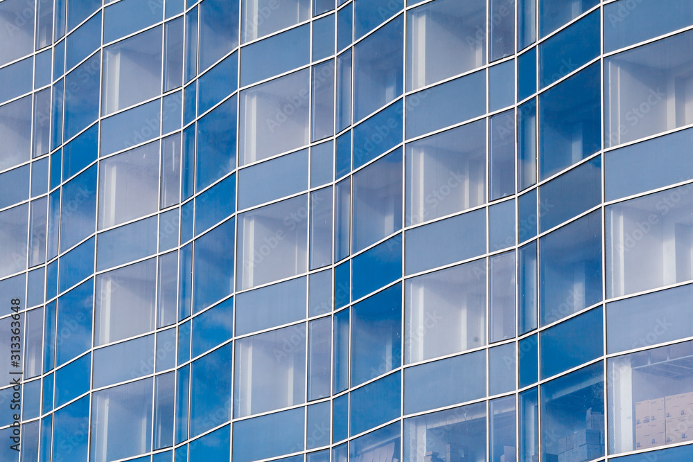 Beautiful architectural structures. Buildings of glass Windows. Background of glass Windows Beautiful architectural structures. Buildings of glass Windows. Background of glass Windows