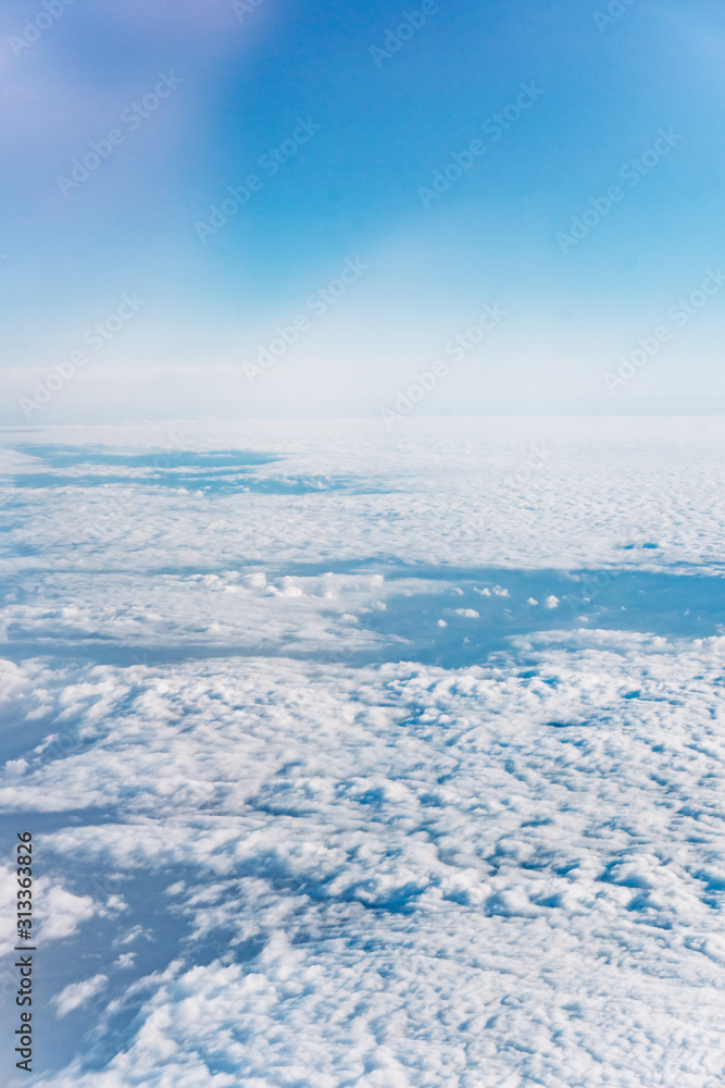 Fantastic background with clouds. The view above the clouds.