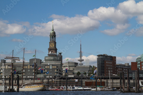 Hamburg, Germany - September 3, 2014: the Hamburg city skyline with the church Michel and the TV tower with ships on the Elbe river in front