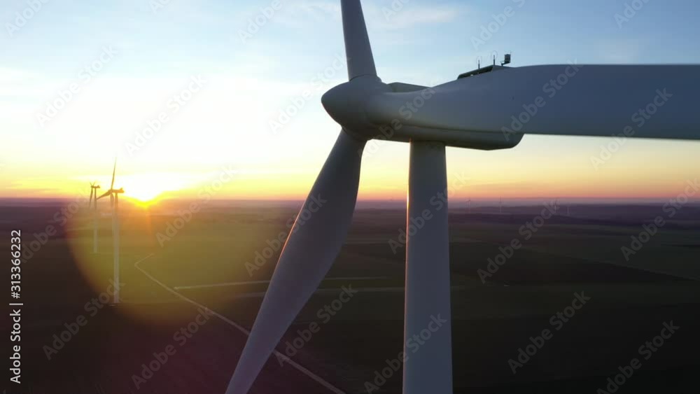 Aerial view of wind turbine at sunset Stock Video | Adobe Stock
