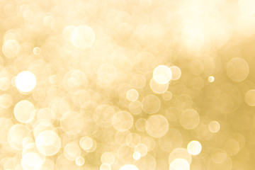 Gold background with light bokeh. Abstrat background