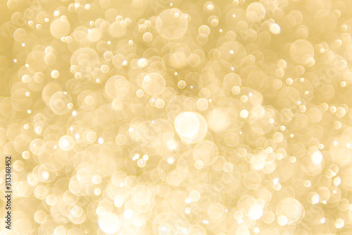 abstract gold background with soft blur bokeh light effect, background bokeh © DEEP PIXEL